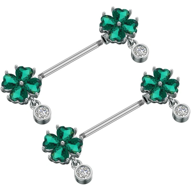 A pair of elegant 14G nipple barbells featuring sparkling cubic zirconia four-leaf clovers in vibrant green, symbolizing luck and style